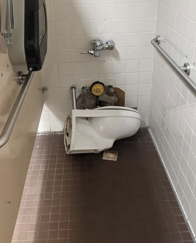 A broken toilet.
